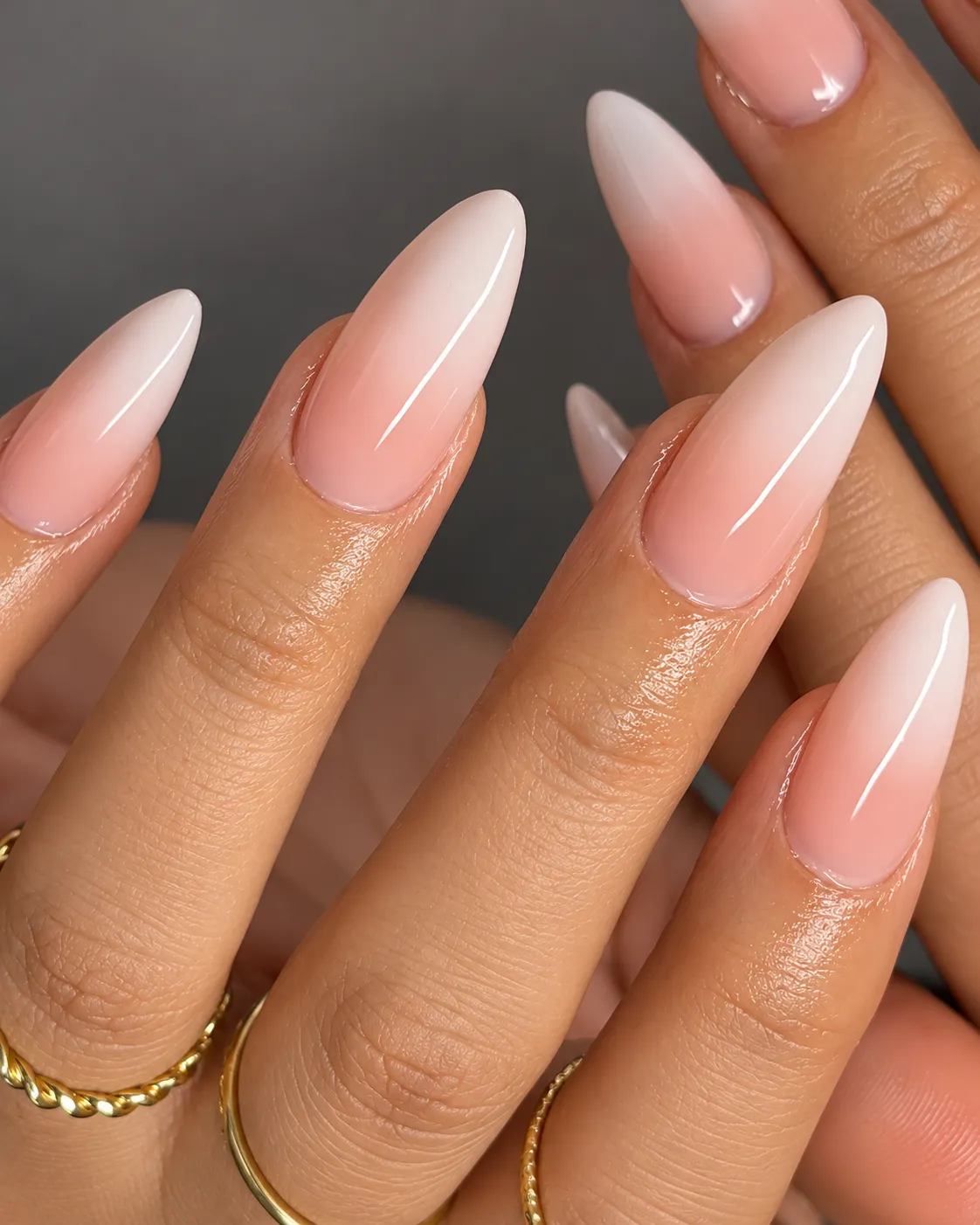 Pink nail enhancements and decorative acrylic nails